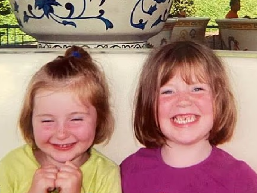 Katie Simpson with her sister as a child.