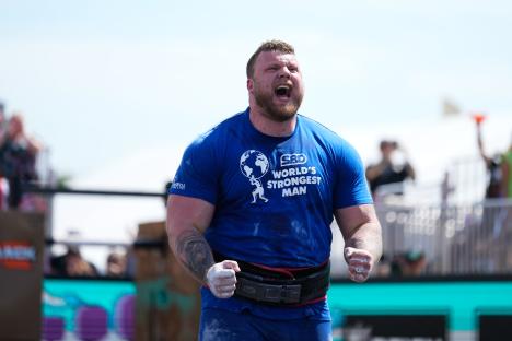 Tom Stoltman, World's Strongest Man, celebrating.