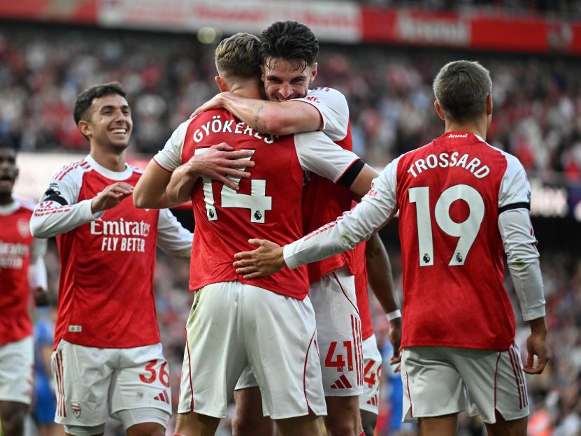 Arsenal players celebrating a goal.