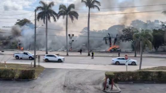 Plane crashes on busy street near Boca Raton airport and bursts into flames as witnesses cry ‘my entire house shook!’