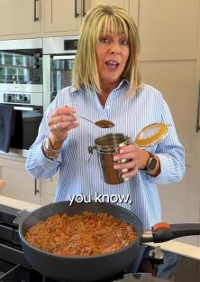 Ruth Langsford cooking spaghetti bolognese and revealing a secret ingredient.