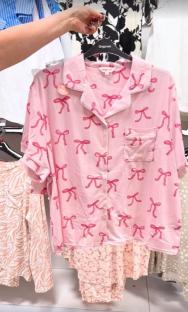 Pink pajama set with pink bows.
