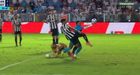 Soccer players vying for the ball.