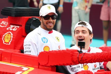 Charles Leclerc and Lewis Hamilton in a Lego Formula 1 car.