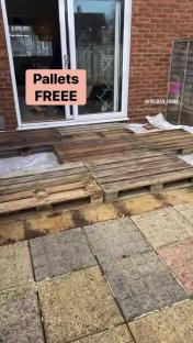 Free pallets being used to create a patio.