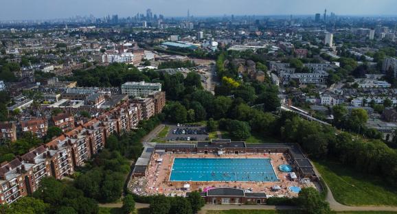 Photographs by Marc Aspland. As maximum daytime temperature reach 30 degrees Celsius bathers take advantage of Parliament Hill Lido. Parliament Hill Lido, located in Hampstead Heath, north London. The lido, also known as Hampstead Heath Lido, is a public unheated open air swimming pool, open for 12 months a year. It first opened in 1938 Photographs by Marc Aspland for The Times & The Sunday Times