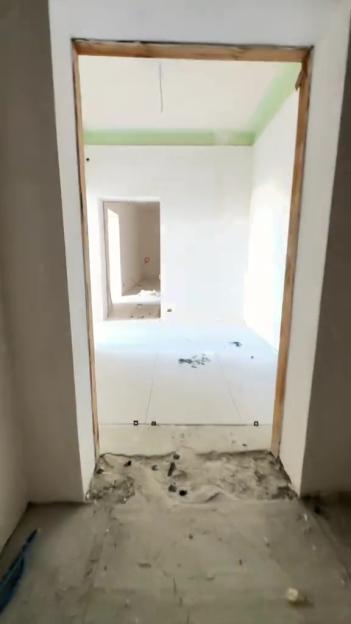Interior view of a room under construction.
