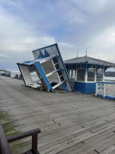 An historic pier ravaged by 93mph winds last winter has stormed back on top - to be named the UK's Pier of the Year. The stunning Llandudno Pier won the prestigious title after battled back from the damage inflicted by Storm Darragh in December. The North Wales seaside resort beat off towns across Britain to take top spot in the awards for the first time in 20 years. The pier was closed for months after damage in Storm Darragh - with a hut blown across the boardwalk and slate roofs and shacks destroyed. National Piers Society chairman Tim Wardley said: