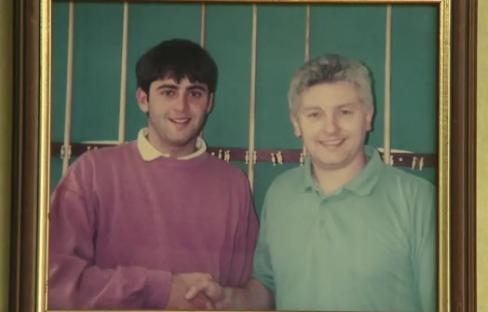 Framed photo of Ronnie O'Sullivan and his cue maker.