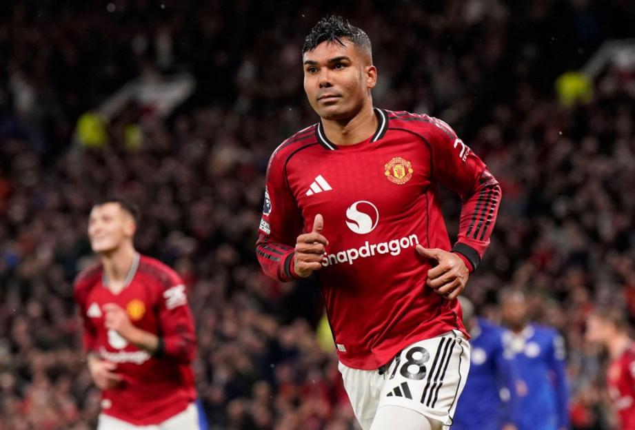 Casemiro of Manchester United celebrates after scoring a goal during a match.