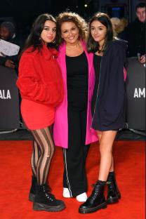 Nadia Sawalha with her daughters at a film premiere.
