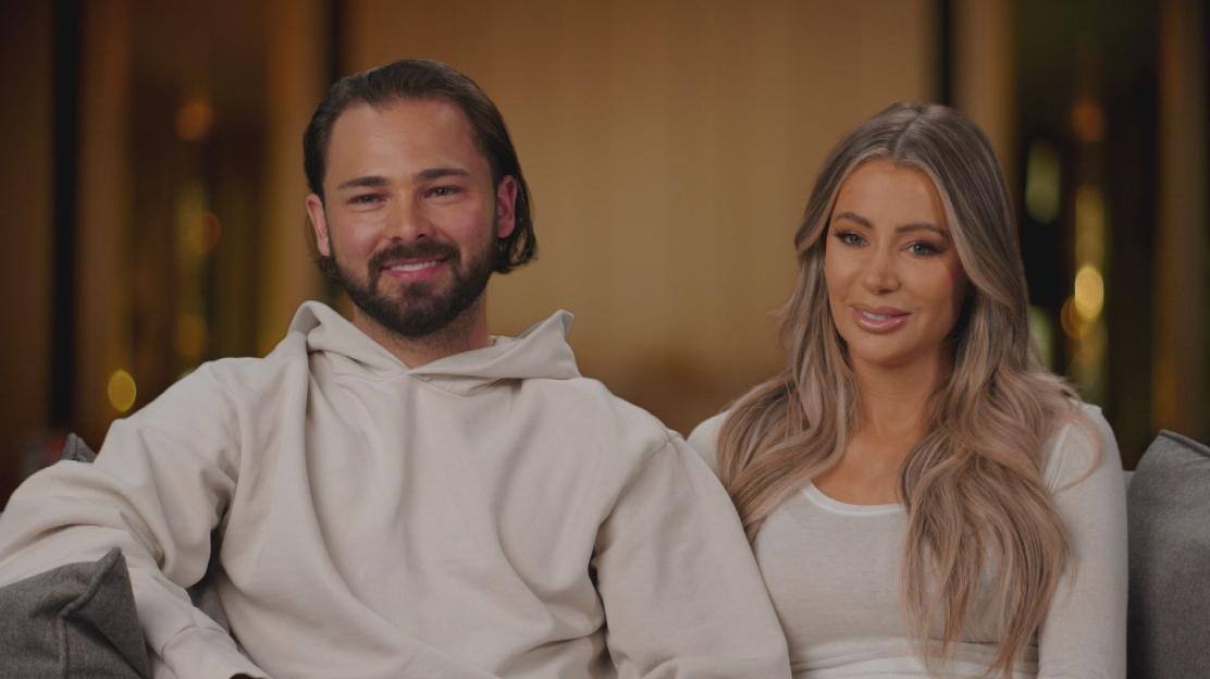 Bradley Dack and Olivia Attwood smiling for the cameras on "Olivia Marries Her Match."