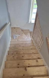Wooden staircase during home renovation.