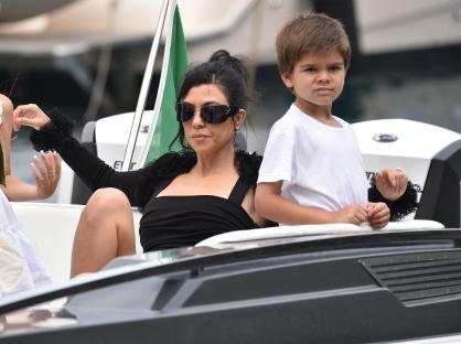 Kourtney Kardashian and her son on a yacht.