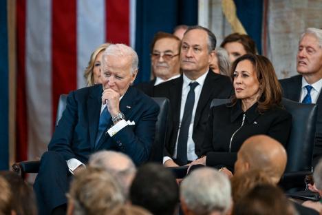 President Biden and Vice President Harris seated at an event.