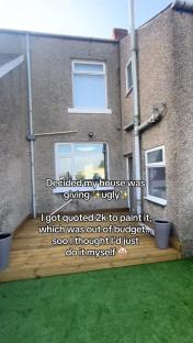 Back of house with garden, needing paint.