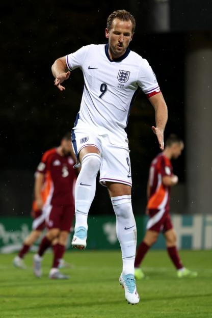 Harry Kane celebrating a goal during the FIFA World Cup 2026 Qualifier match between Latvia and England.