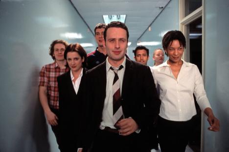 Photo of the cast of Channel 4's Teachers walking down a hallway.