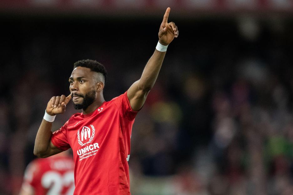 Emmanuel Dennis of Nottingham Forest celebrating a goal.
