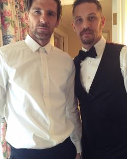 Tom Hardy and Paul Anderson on a film set.