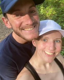 A smiling couple posing for a selfie.