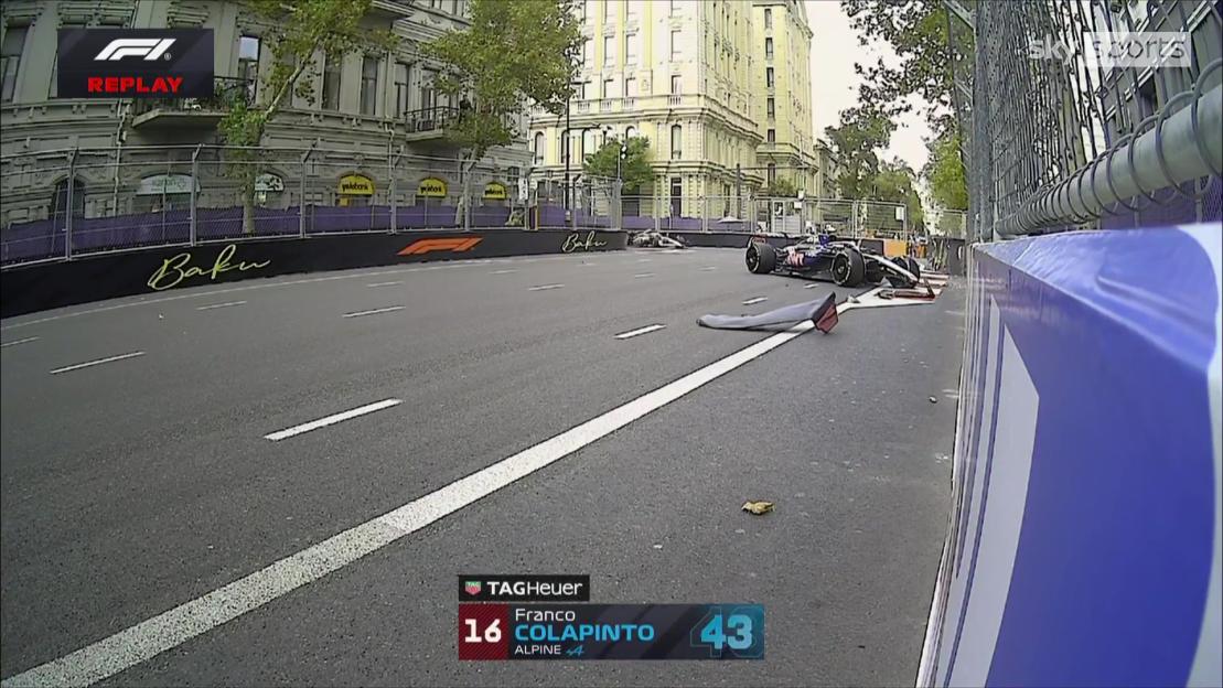 Damaged race cars on the Baku street circuit after a crash.