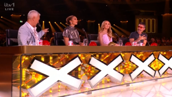 Screenshot of the judges' panel on The X Factor.