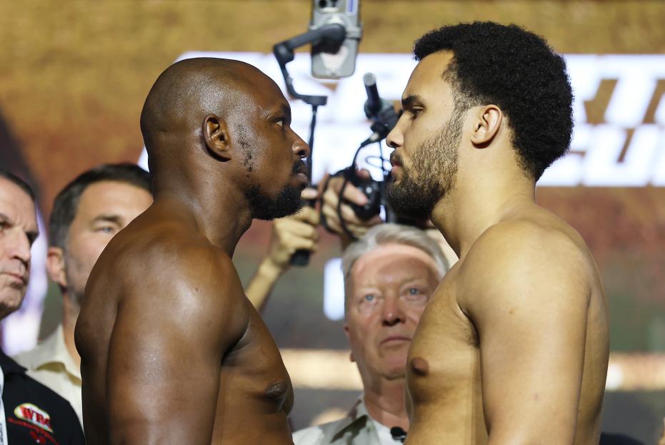Dillian Whyte and Moses Itauma face off at a weigh-in.
