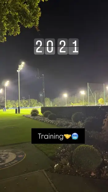 Night view of a sports field with illuminated floodlights and "2021 Training" text overlay.