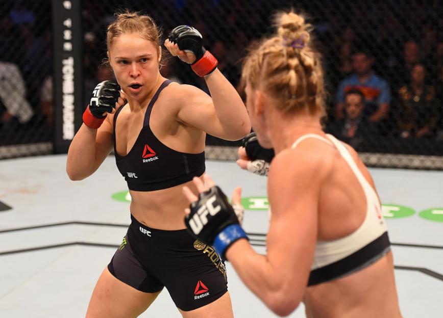 MELBOURNE, AUSTRALIA - NOVEMBER 15: (L-R) Ronda Rousey and Holly Holm size each other up in the first round in their UFC women's bantamweight championship bout during the UFC 193 event at Etihad Stadium on November 15, 2015 in Melbourne, Australia. (Photo by Josh Hedges/Zuffa LLC/Zuffa LLC via Getty Images)