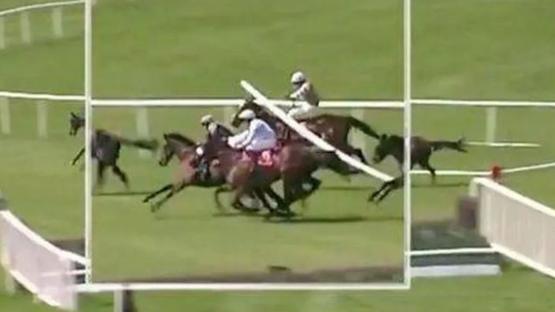Shocking moment jockey is hit in the head after horse crashes into railings in chaotic race at Punchestown Festival