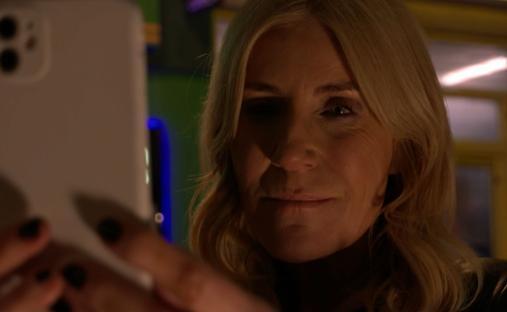 Woman looking at a smartphone.