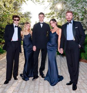 The Beckham family posing for a photo.