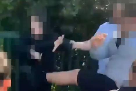 Horrific moment man holds schoolboy’s jumper while CHILDREN beat him up in heinous broad-daylight assault