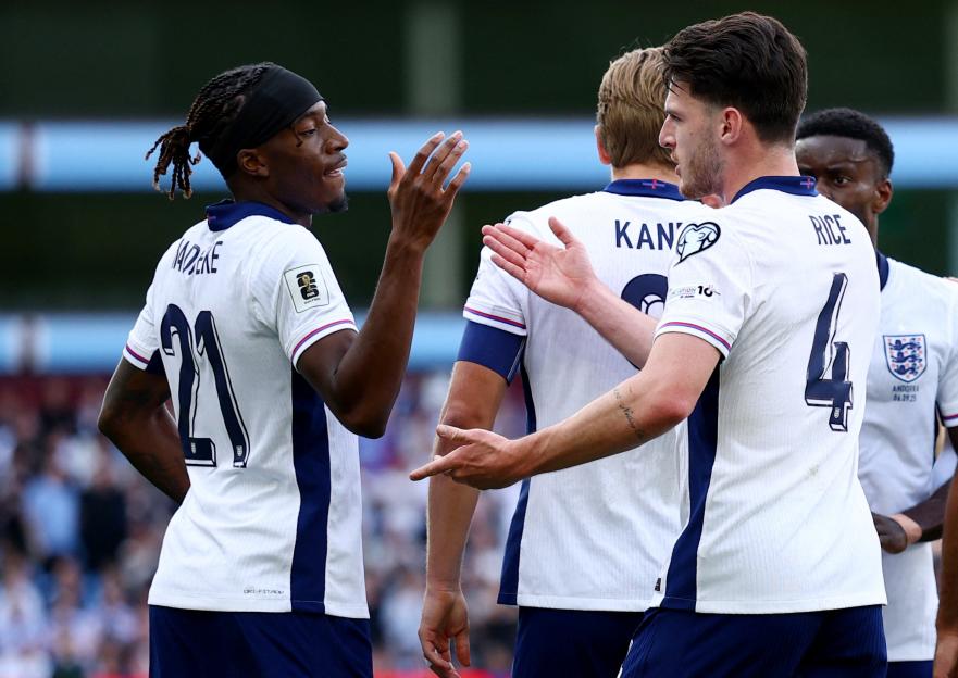 Noni Madueke and Declan Rice celebrating a goal.