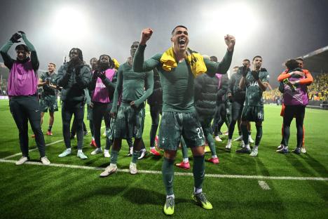 Pedro Porro of Tottenham Hotspur celebrates a victory.