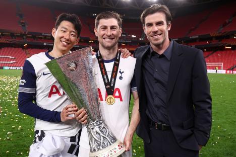 Son Heung-min, Ben Davies, and Gareth Bale with the Europa League trophy.