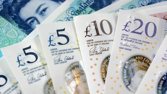 British five, ten, and twenty pound notes.