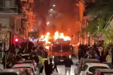 Shock vids shows Athens turned into WARZONE as petrol-bomb armed mob attack police with 21 cars torched & 72 arrested