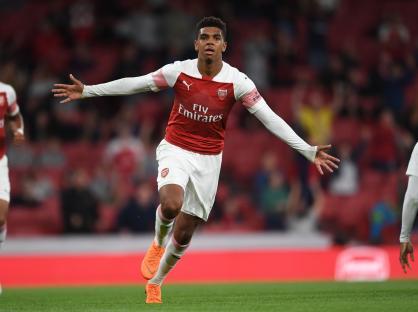 Tyreece John-Jules celebrating an Arsenal goal.