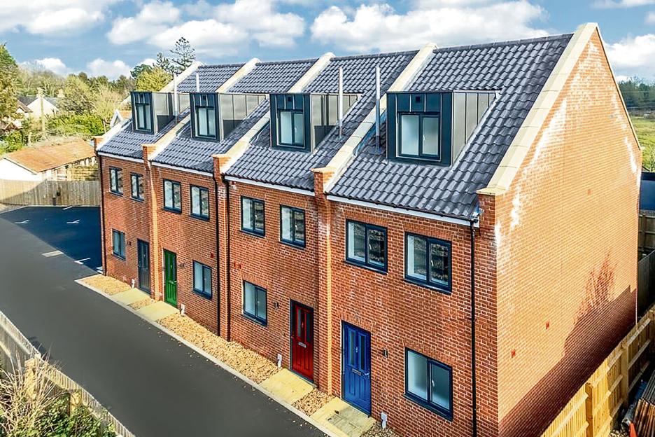Row of new brick houses.