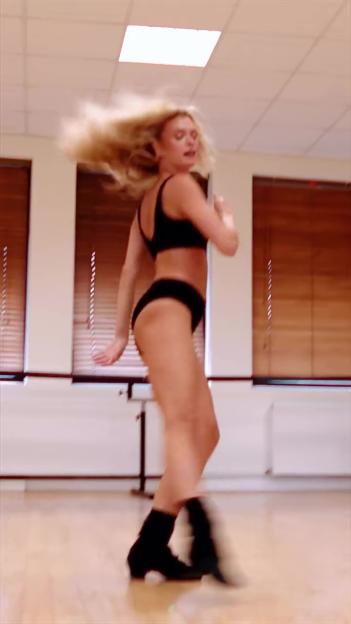 Nadiya Bychkova dancing in black underwear.