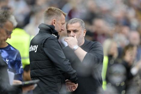 Graham Potter and Ange Postecoglou speaking at a soccer match.