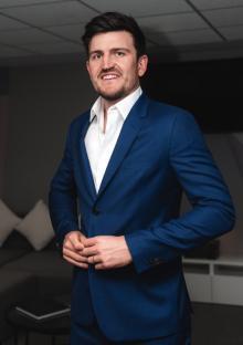 Man in a blue suit.