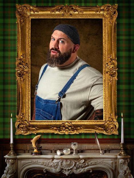Joe Mahler in a gold frame above a fireplace.