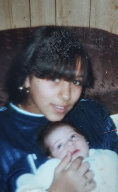 Correne Dadd, 40, holding her eldest son Josh as a baby.