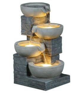 Four-tier cascading water feature with lights.