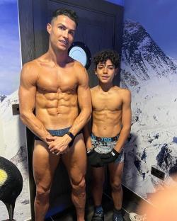 Cristiano Ronaldo and his son Cristiano Ronaldo Jr. shirtless.