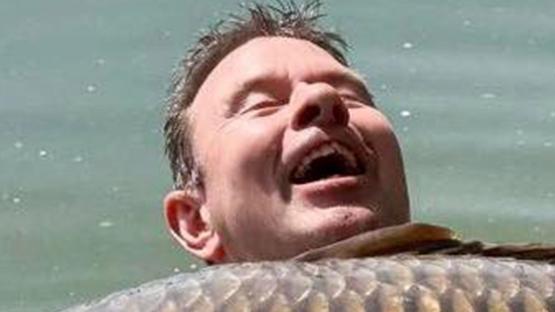 Angler catches world’s biggest carp weighing almost EIGHT STONE and is left ‘in total disbelief’