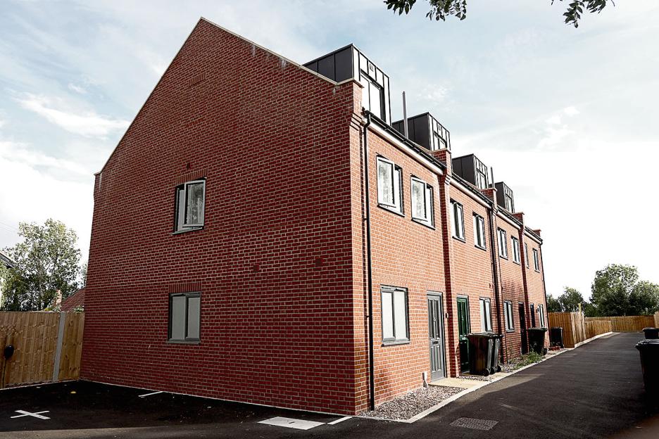 Row of new brick townhouses.